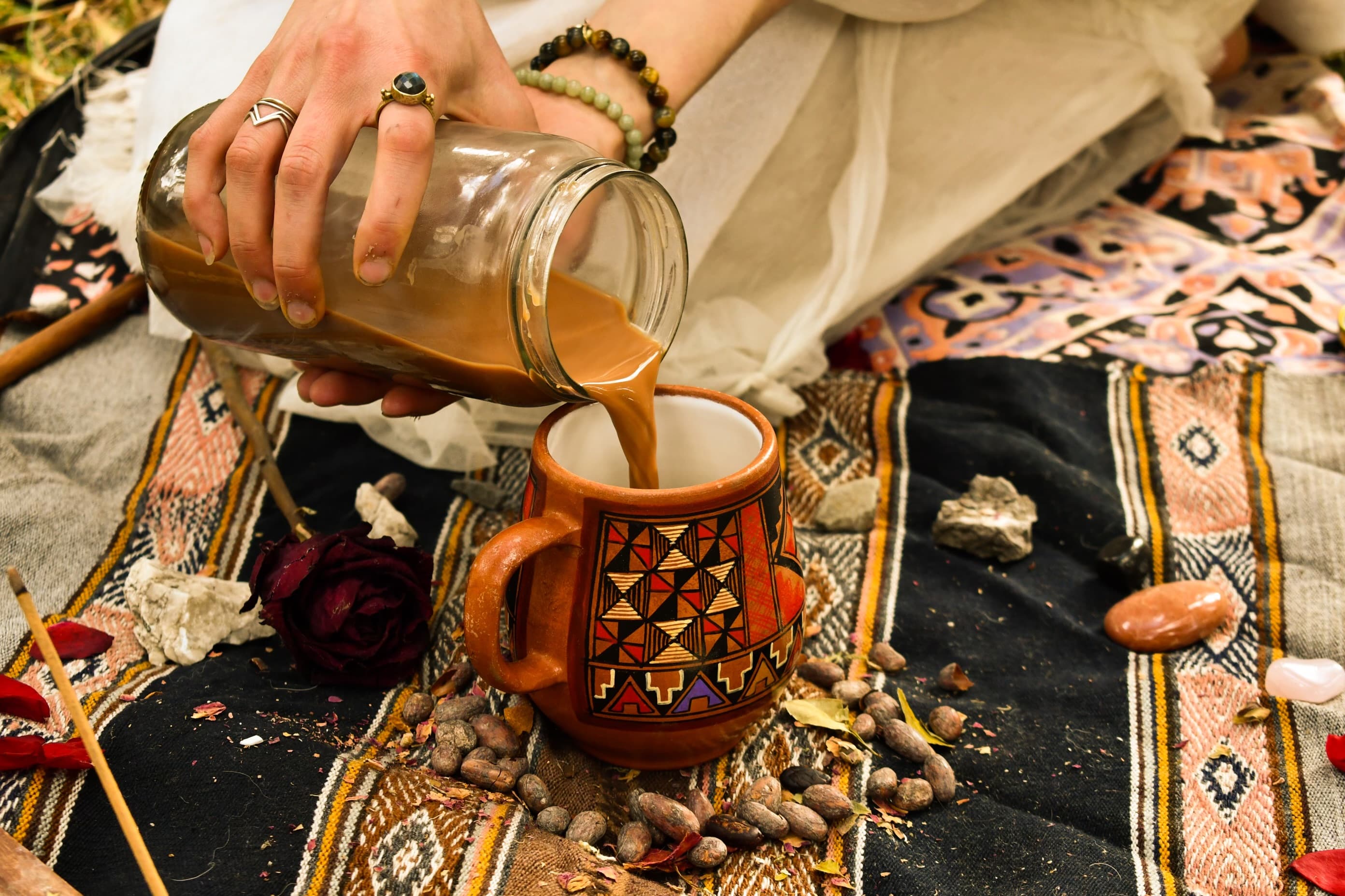 cacao pouring in cacao ceremony